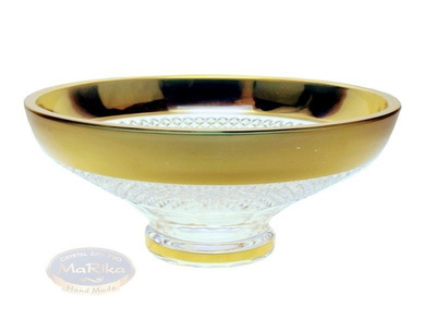 Crystal golden bowl on the foot.